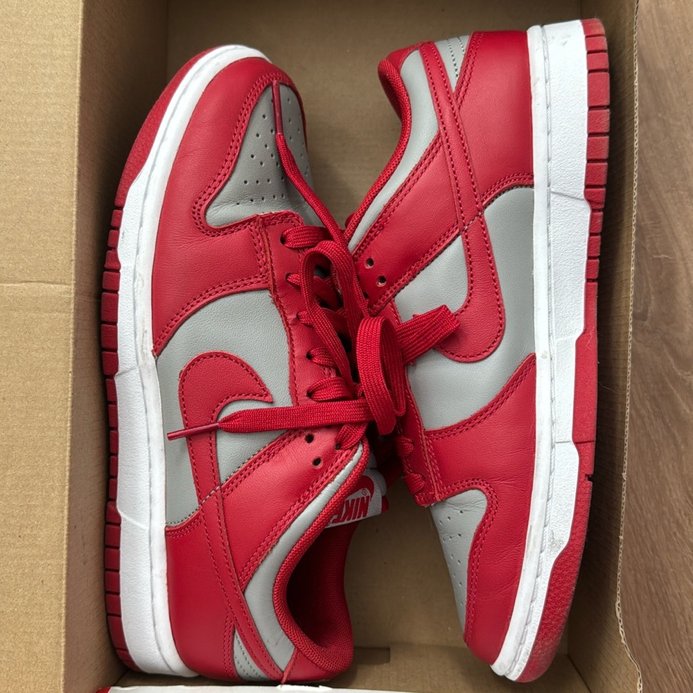 Red and grey Nike dunk lows